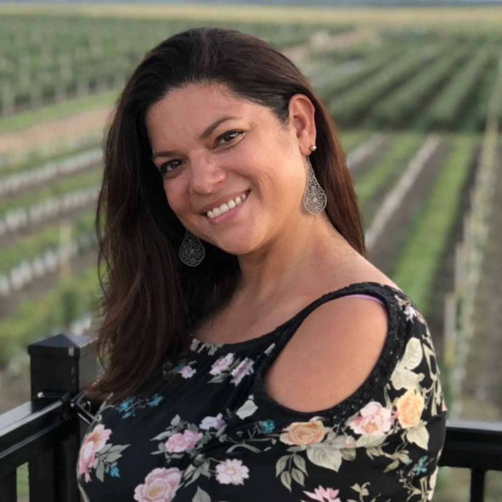 Elisa Santos, Vice President & Mentor