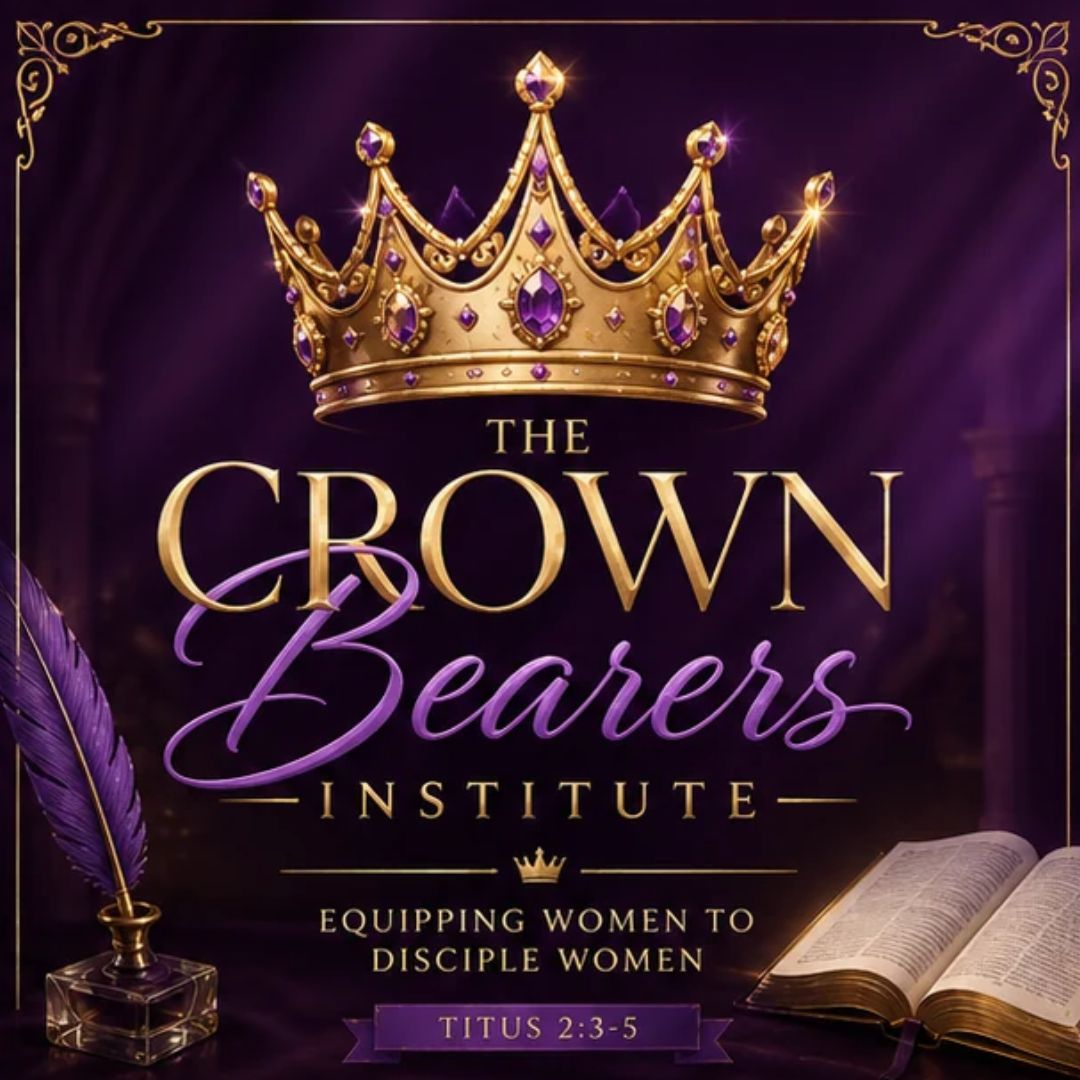 An older woman mentoring a younger woman over an open Bible